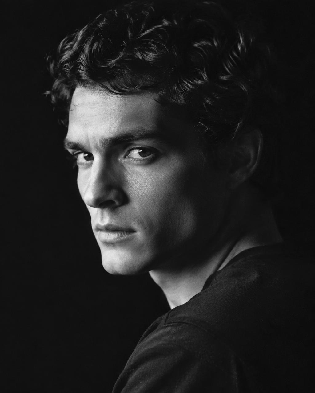 Black and white editorial portrait of an actor
